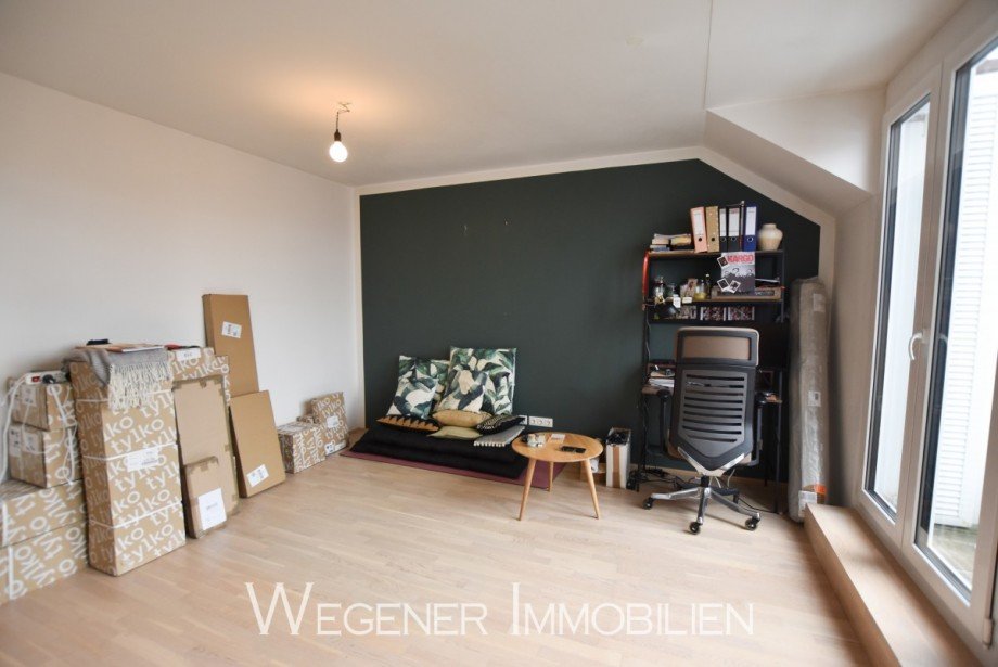 Wohnzimmer Dachgeschosswohnung Putzbrunn
