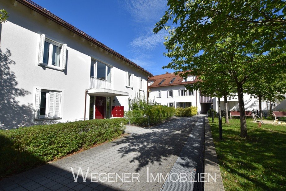 Mehrparteienhaus Dachgeschosswohnung Putzbrunn
